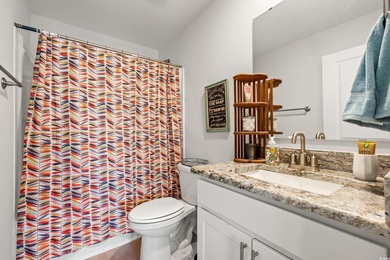 Live like you're on vacation every day in this impressive on Surf Golf and Beach Club in South Carolina - for sale on GolfHomes.com, golf home, golf lot