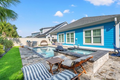 Live like you're on vacation every day in this impressive on Surf Golf and Beach Club in South Carolina - for sale on GolfHomes.com, golf home, golf lot