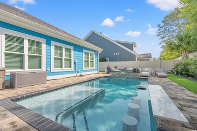 Live like you're on vacation every day in this impressive on Surf Golf and Beach Club in South Carolina - for sale on GolfHomes.com, golf home, golf lot