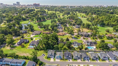 Live like you're on vacation every day in this impressive on Surf Golf and Beach Club in South Carolina - for sale on GolfHomes.com, golf home, golf lot