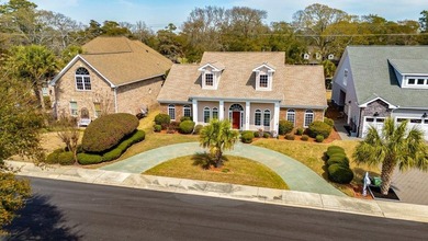 Located just two short blocks from the beach, this beautiful on Surf Golf and Beach Club in South Carolina - for sale on GolfHomes.com, golf home, golf lot