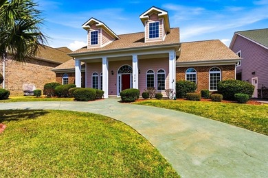 Located just two short blocks from the beach, this beautiful on Surf Golf and Beach Club in South Carolina - for sale on GolfHomes.com, golf home, golf lot