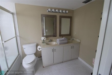 ESTATE SALE, MOTIVATED SELLER. GREAT OPPORTUNITY TO OWN A 2/2 on Wynmoor Golf Course in Florida - for sale on GolfHomes.com, golf home, golf lot