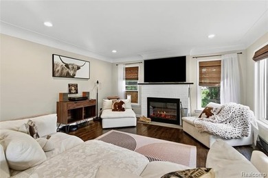 Enjoy a beautiful blend of comfort and character with this on Kearsley Lake Golf Course in Michigan - for sale on GolfHomes.com, golf home, golf lot