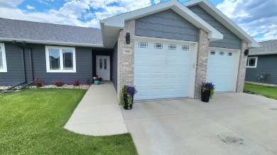 A beautiful ranch townhouse duplex located near the Spencer Golf on Spencer Golf and Country Club in Iowa - for sale on GolfHomes.com, golf home, golf lot