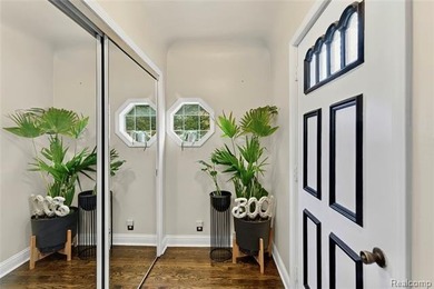 Enjoy a beautiful blend of comfort and character with this on Kearsley Lake Golf Course in Michigan - for sale on GolfHomes.com, golf home, golf lot