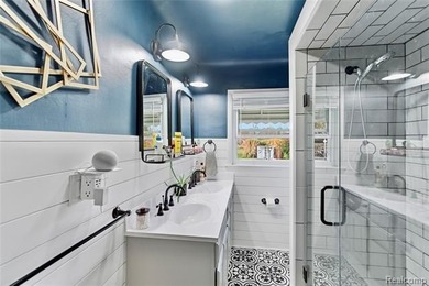 Enjoy a beautiful blend of comfort and character with this on Kearsley Lake Golf Course in Michigan - for sale on GolfHomes.com, golf home, golf lot