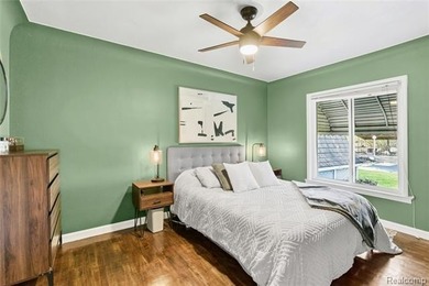 Enjoy a beautiful blend of comfort and character with this on Kearsley Lake Golf Course in Michigan - for sale on GolfHomes.com, golf home, golf lot