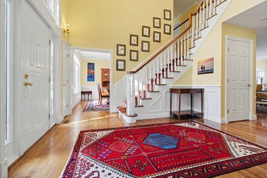 Nestled on a private, wooded half-acre cul-de-sac in the on Polo Fields Golf and Country Club in Michigan - for sale on GolfHomes.com, golf home, golf lot