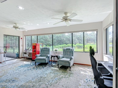 Tired of looking at the same old cookie cutter style homes? Then on Sugarmill Woods Golf and Country Club in Florida - for sale on GolfHomes.com, golf home, golf lot