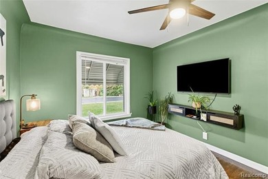 Enjoy a beautiful blend of comfort and character with this on Kearsley Lake Golf Course in Michigan - for sale on GolfHomes.com, golf home, golf lot