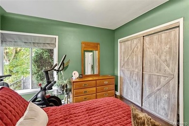 Enjoy a beautiful blend of comfort and character with this on Kearsley Lake Golf Course in Michigan - for sale on GolfHomes.com, golf home, golf lot