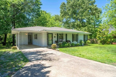 Welcome to 102 Country Club Dr., a beautifully updated 2-bedroom on Hot Springs Golf and Country Club in Arkansas - for sale on GolfHomes.com, golf home, golf lot