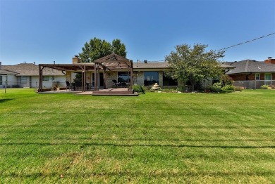 Welcome to this charming 1960s ranch-style home on Lake Hefner on Lake Hefner Golf Club in Oklahoma - for sale on GolfHomes.com, golf home, golf lot