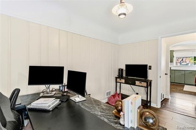 Enjoy a beautiful blend of comfort and character with this on Kearsley Lake Golf Course in Michigan - for sale on GolfHomes.com, golf home, golf lot