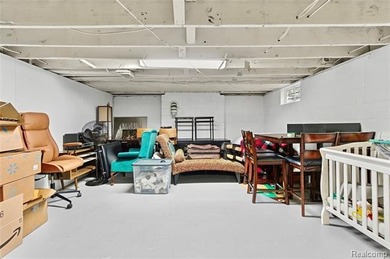 Enjoy a beautiful blend of comfort and character with this on Kearsley Lake Golf Course in Michigan - for sale on GolfHomes.com, golf home, golf lot