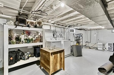 Enjoy a beautiful blend of comfort and character with this on Kearsley Lake Golf Course in Michigan - for sale on GolfHomes.com, golf home, golf lot