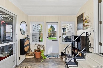 Enjoy a beautiful blend of comfort and character with this on Kearsley Lake Golf Course in Michigan - for sale on GolfHomes.com, golf home, golf lot