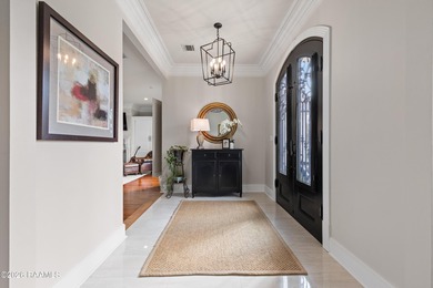 I am obsessed! Absolutely gorgeous! Overlooking the pond & golf on LeTriomphe Golf and Country Club in Louisiana - for sale on GolfHomes.com, golf home, golf lot