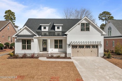 BRAND NEW Delaney Coastal Construction Custom style home without on Carolina National Golf Club in North Carolina - for sale on GolfHomes.com, golf home, golf lot