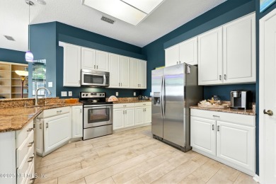 This beautiful brick home is ideal for multi-generational living on Windsor Parke Golf Club in Florida - for sale on GolfHomes.com, golf home, golf lot