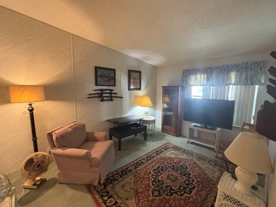 This home is located within a 55 + resort style leased land on Big Cypress Golf and Country Club in Florida - for sale on GolfHomes.com, golf home, golf lot