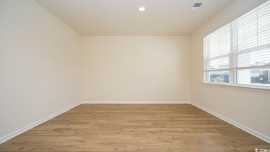 Discover this spacious and beautifully maintained 5-bedroom, 3 on Arrowhead Country Club in South Carolina - for sale on GolfHomes.com, golf home, golf lot