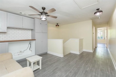 Under contract-accepting backup offers. Escape the hustle and on Heritage Isles Golf and Country Club in Florida - for sale on GolfHomes.com, golf home, golf lot