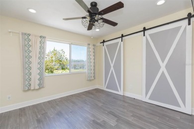 Under contract-accepting backup offers. Escape the hustle and on Heritage Isles Golf and Country Club in Florida - for sale on GolfHomes.com, golf home, golf lot