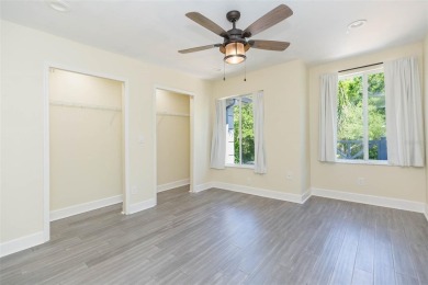 Under contract-accepting backup offers. Escape the hustle and on Heritage Isles Golf and Country Club in Florida - for sale on GolfHomes.com, golf home, golf lot