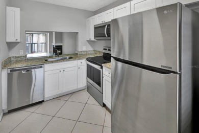 AVAILABLE NOW! UNFURNISHED 2ND FLOOR condo in gated & guarded on Feather Sound Country Club in Florida - for sale on GolfHomes.com, golf home, golf lot
