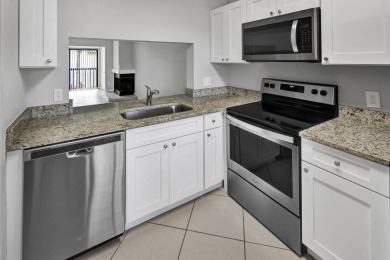 AVAILABLE NOW! UNFURNISHED 2ND FLOOR condo in gated & guarded on Feather Sound Country Club in Florida - for sale on GolfHomes.com, golf home, golf lot
