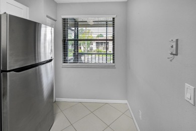 AVAILABLE NOW! UNFURNISHED 2ND FLOOR condo in gated & guarded on Feather Sound Country Club in Florida - for sale on GolfHomes.com, golf home, golf lot