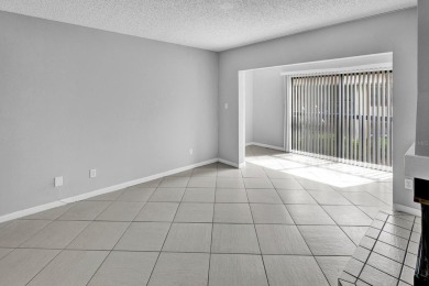 AVAILABLE NOW! UNFURNISHED 2ND FLOOR condo in gated & guarded on Feather Sound Country Club in Florida - for sale on GolfHomes.com, golf home, golf lot