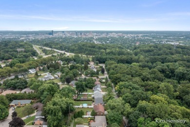 Welcome to 1819 Fulton Street NW! Situated on a serene street on Mines Golf Course in Michigan - for sale on GolfHomes.com, golf home, golf lot