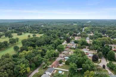 Welcome to 1819 Fulton Street NW! Situated on a serene street on Mines Golf Course in Michigan - for sale on GolfHomes.com, golf home, golf lot