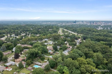 Welcome to 1819 Fulton Street NW! Situated on a serene street on Mines Golf Course in Michigan - for sale on GolfHomes.com, golf home, golf lot