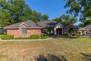 Located in the sought-after, gated community of Pecan Plantation on Pecan Plantation Country Club in Texas - for sale on GolfHomes.com, golf home, golf lot