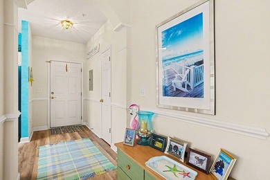 Welcome to this bright and beachy 2-bedroom, 2-bath end-unit on  in South Carolina - for sale on GolfHomes.com, golf home, golf lot