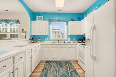 Welcome to this bright and beachy 2-bedroom, 2-bath end-unit on  in South Carolina - for sale on GolfHomes.com, golf home, golf lot