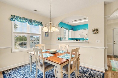 Welcome to this bright and beachy 2-bedroom, 2-bath end-unit on  in South Carolina - for sale on GolfHomes.com, golf home, golf lot