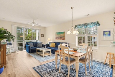 Welcome to this bright and beachy 2-bedroom, 2-bath end-unit on  in South Carolina - for sale on GolfHomes.com, golf home, golf lot