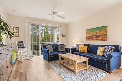 Welcome to this bright and beachy 2-bedroom, 2-bath end-unit on  in South Carolina - for sale on GolfHomes.com, golf home, golf lot