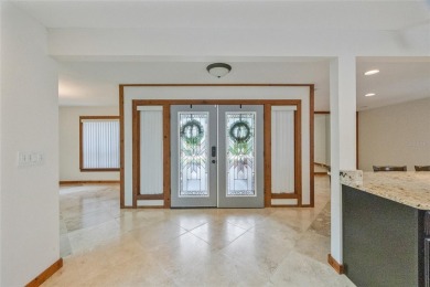 Welcome to waterfront living at its finest. This home is located on Seminole Lake Country Club in Florida - for sale on GolfHomes.com, golf home, golf lot