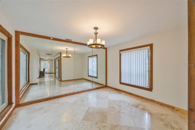 Welcome to waterfront living at its finest. This home is located on Seminole Lake Country Club in Florida - for sale on GolfHomes.com, golf home, golf lot