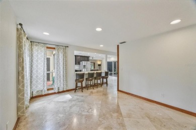 Welcome to waterfront living at its finest. This home is located on Seminole Lake Country Club in Florida - for sale on GolfHomes.com, golf home, golf lot