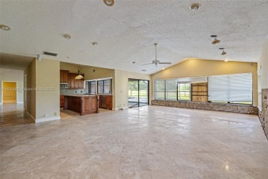 Incredible opportunity to own a spacious 4-bedroom plus on Country Club of Coral Springs in Florida - for sale on GolfHomes.com, golf home, golf lot
