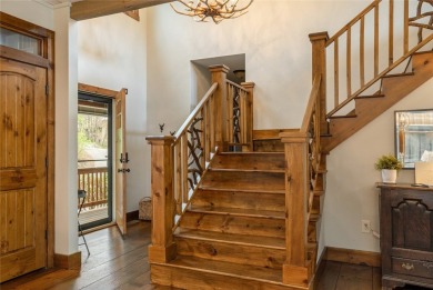 Experience breathtaking long-range mountain views and a serene on Sapphire National Golf Club in North Carolina - for sale on GolfHomes.com, golf home, golf lot