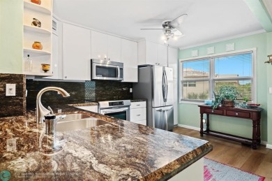 Beautifully renovated unit.  Corner unit, panoramic views of the on Wynmoor Golf Course in Florida - for sale on GolfHomes.com, golf home, golf lot