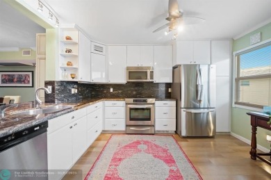 Beautifully renovated unit.  Corner unit, panoramic views of the on Wynmoor Golf Course in Florida - for sale on GolfHomes.com, golf home, golf lot